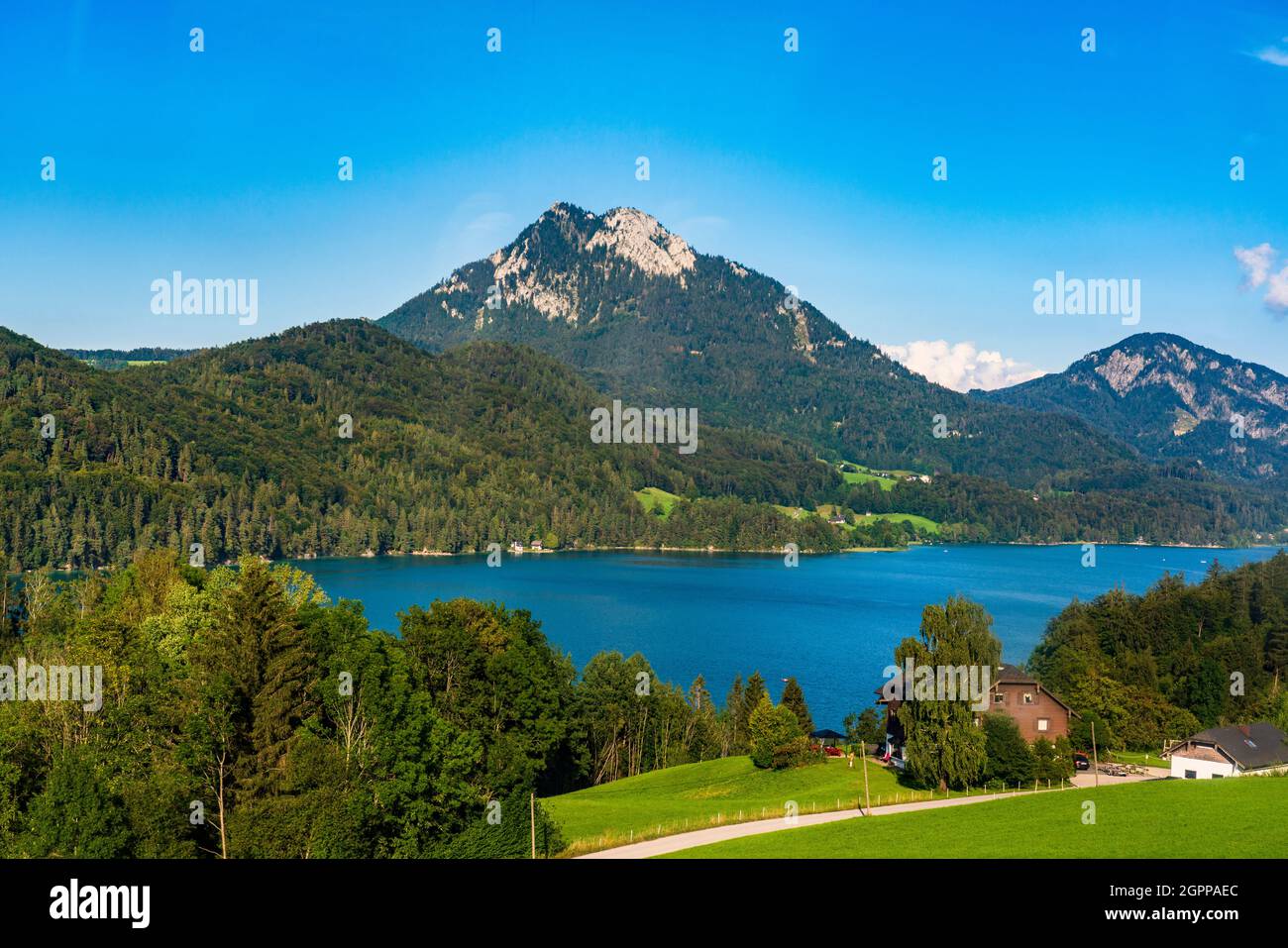 Austria, Fuschl am See, Fuschlsee surrounded with mountains Stock Photo