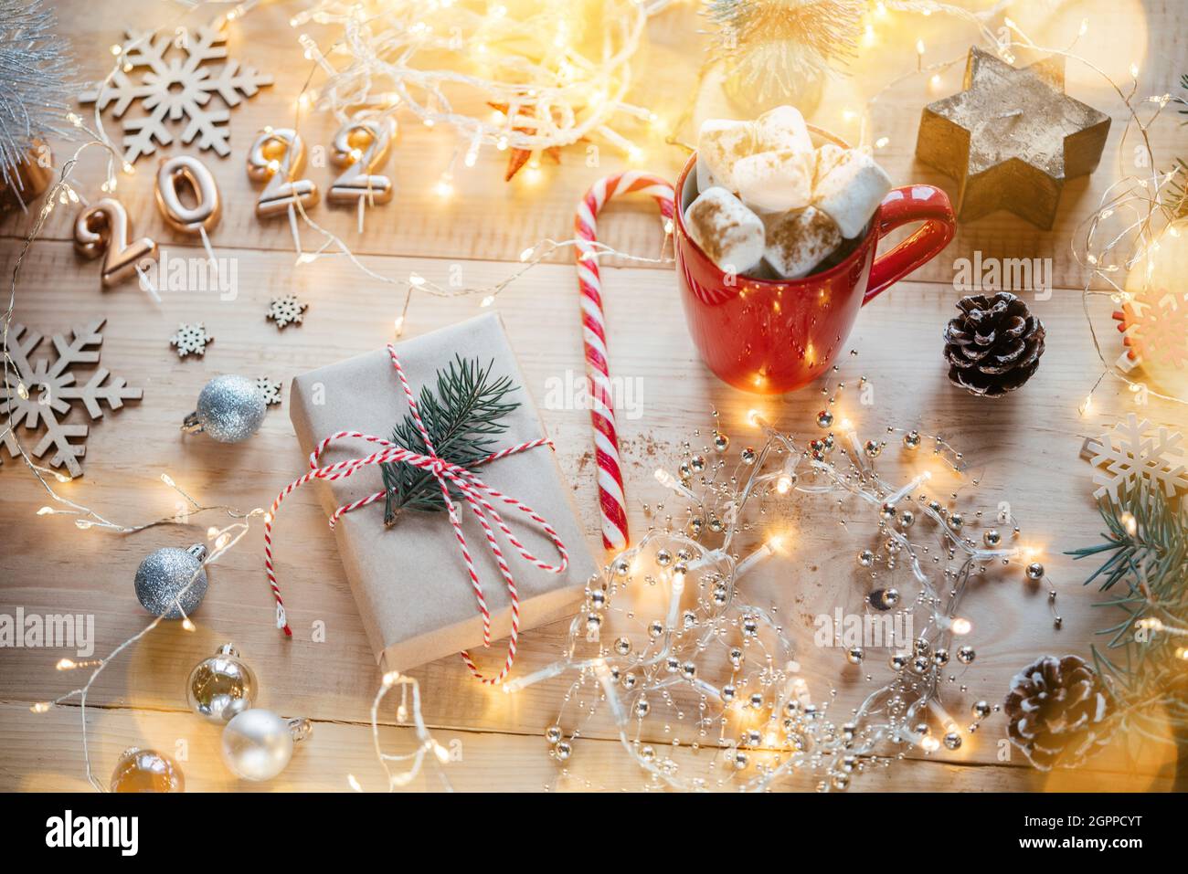 Christmas Goods 2022 Christmas Composition With Gift Box, Marshmallow Hot Chocolate, Christmas  Decorations And Golden 2022 Numbers Stock Photo - Alamy