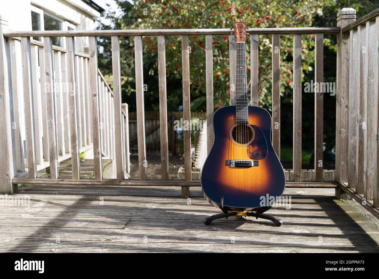 2002 Martin D-18GE, with removed popsicle brace, hot hide glued bridge and shaved back braces. It's an absolute delight to play. Stock Photo