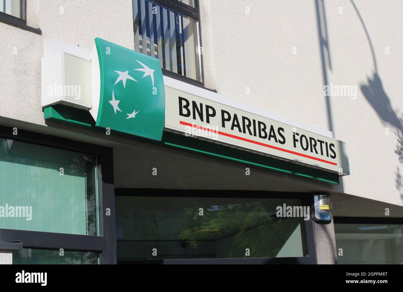 LEBBEKE, BELGIUM, 25 AUGUST 2021: Exterior view of a branch of BNP Paribas Fortis High street Banks. It is currently the largest bank in Belgium. Stock Photo