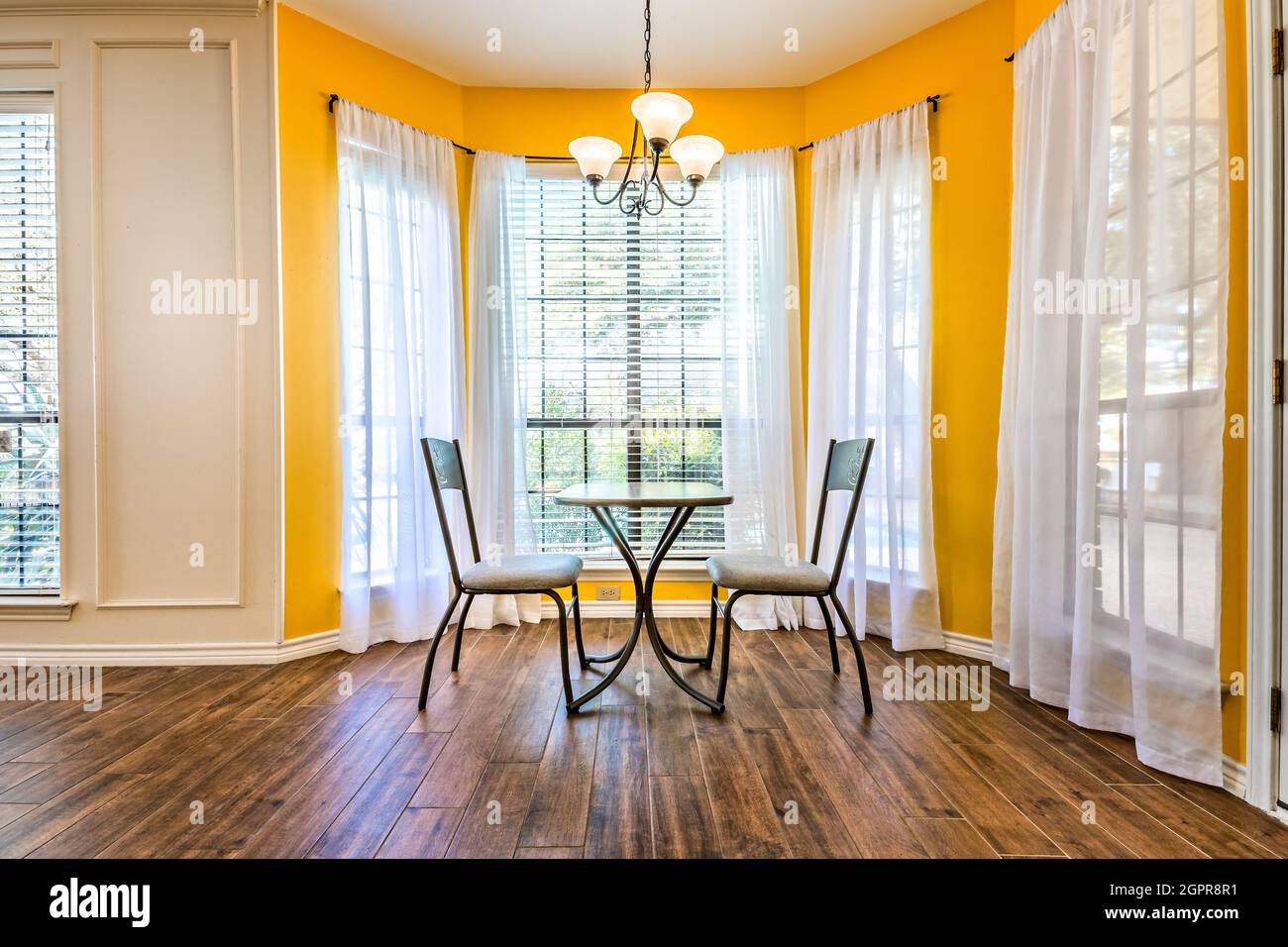 Breakfast nook with bay windows in a Texas house Stock Photo Alamy