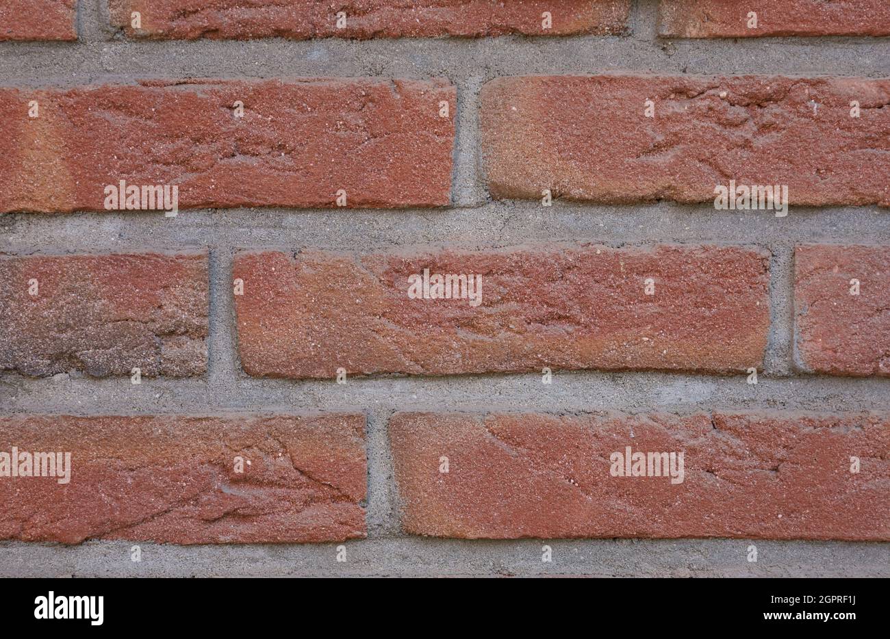Bonn Germany September 2021 Image-filling close-up of a clinker wall with red bricks Stock Photo