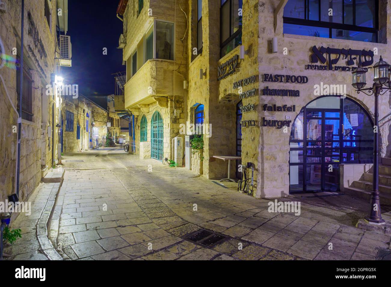 Safed, Israel - September 28, 2021: Evening view of an alley in the Jewish quarter, the old city of Safed (Tzfat), Israel Stock Photo