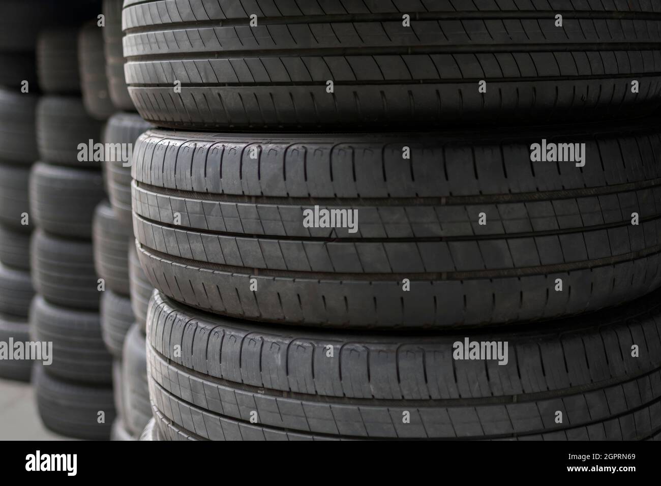 Full Frame Shot Of A Stack Of Used Tires Stock Photo