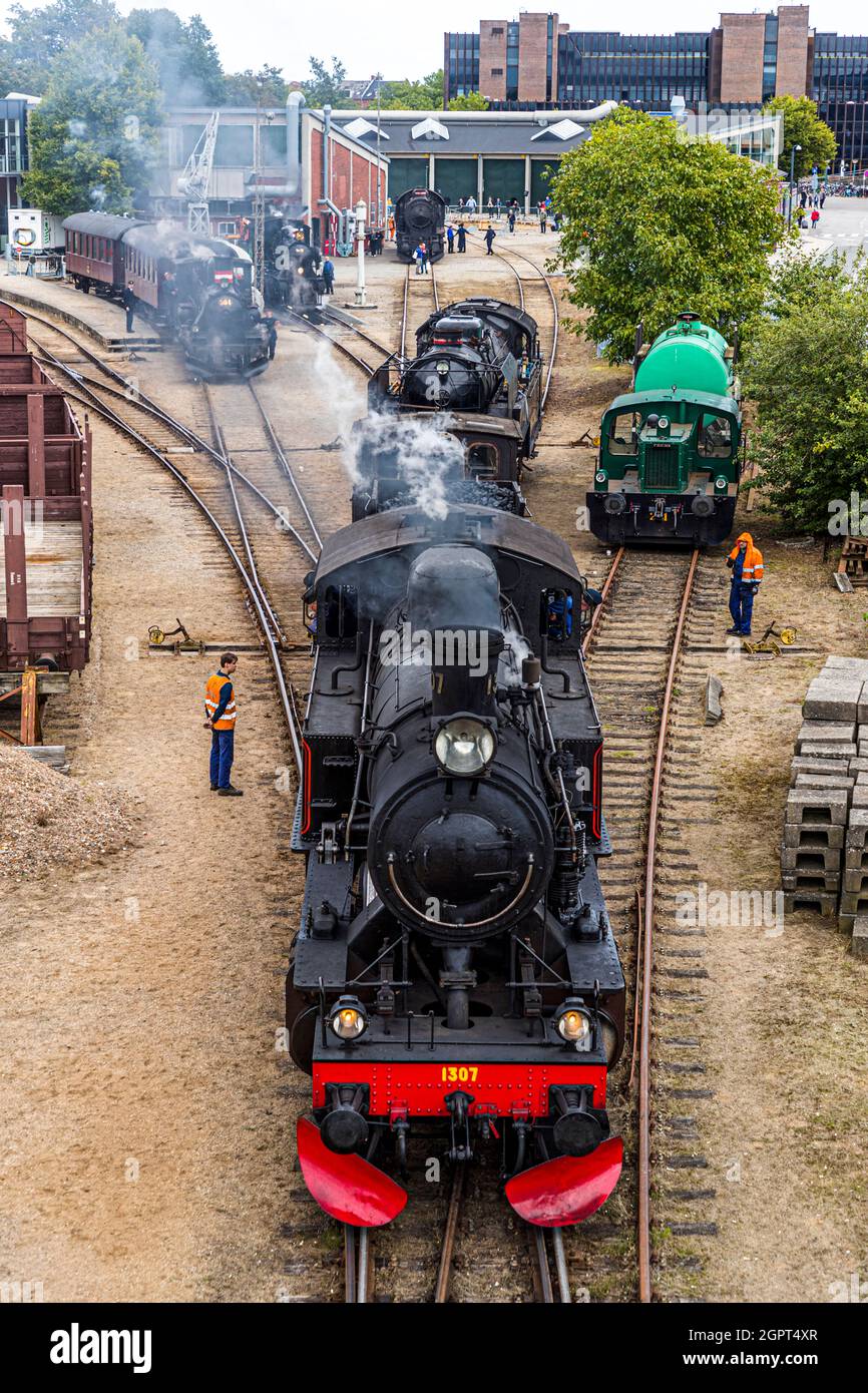 Steam locomotive meeting at the Odense Railway Museum (Jernbanemuseum) in Odense, Denmark. Due to Corona's delay of one year, the event (Dampdage 2021) commemorated the end of Danish steam locomotive operation half a century ago in 1970 Stock Photo