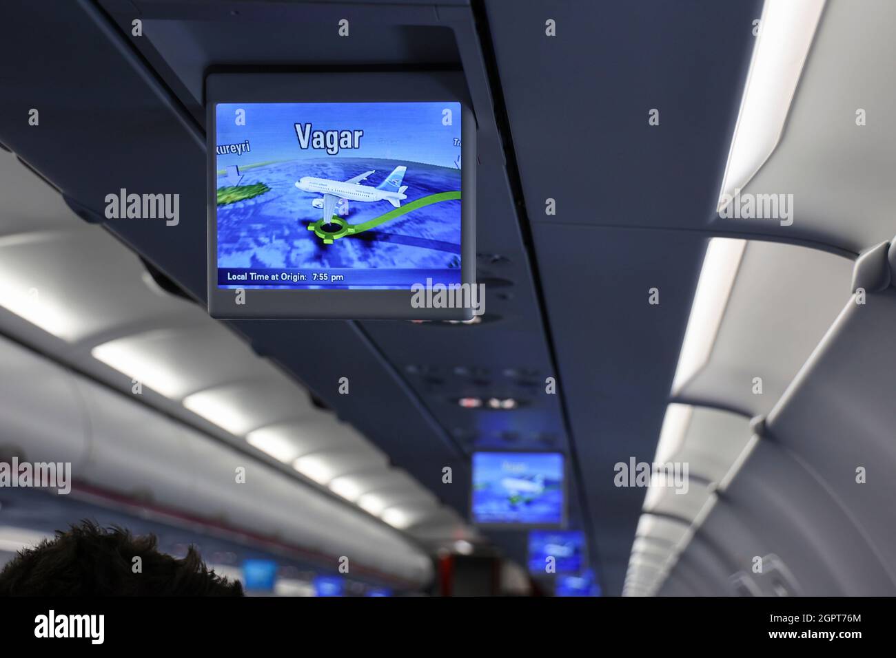 Monitor inside an aircraft cabin showing flight position shortly before ...