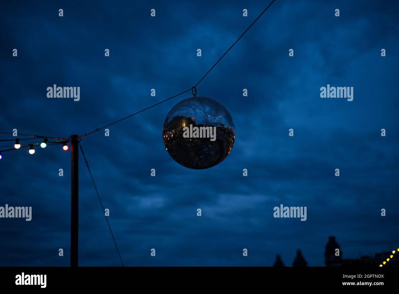 Disco Ball In The Cloudy Sky Stock Photo Alamy