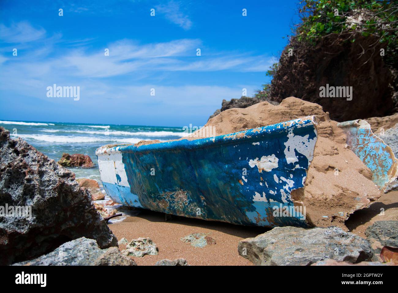 Old Broken Boat Wash Up On Shore At The Beach Stock Photo Alamy