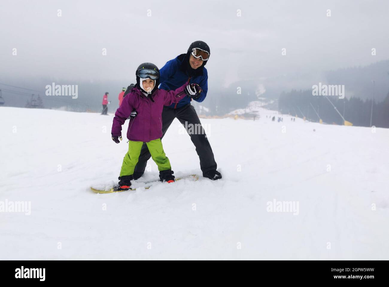 snowboard lesson in winter resort Stock Photo