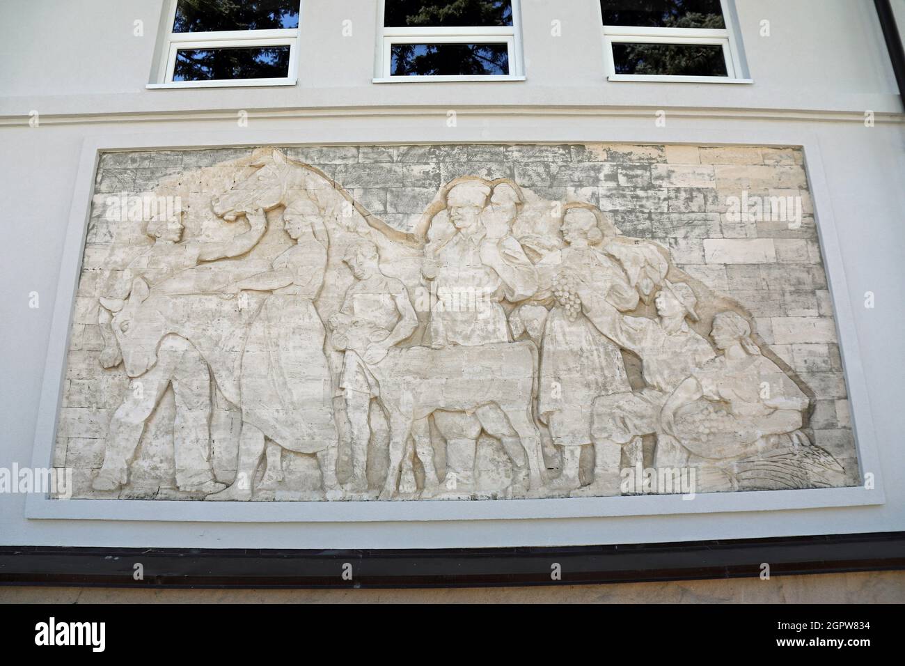 Soviet relief on the Madison Park event hall in Chisinau Stock Photo