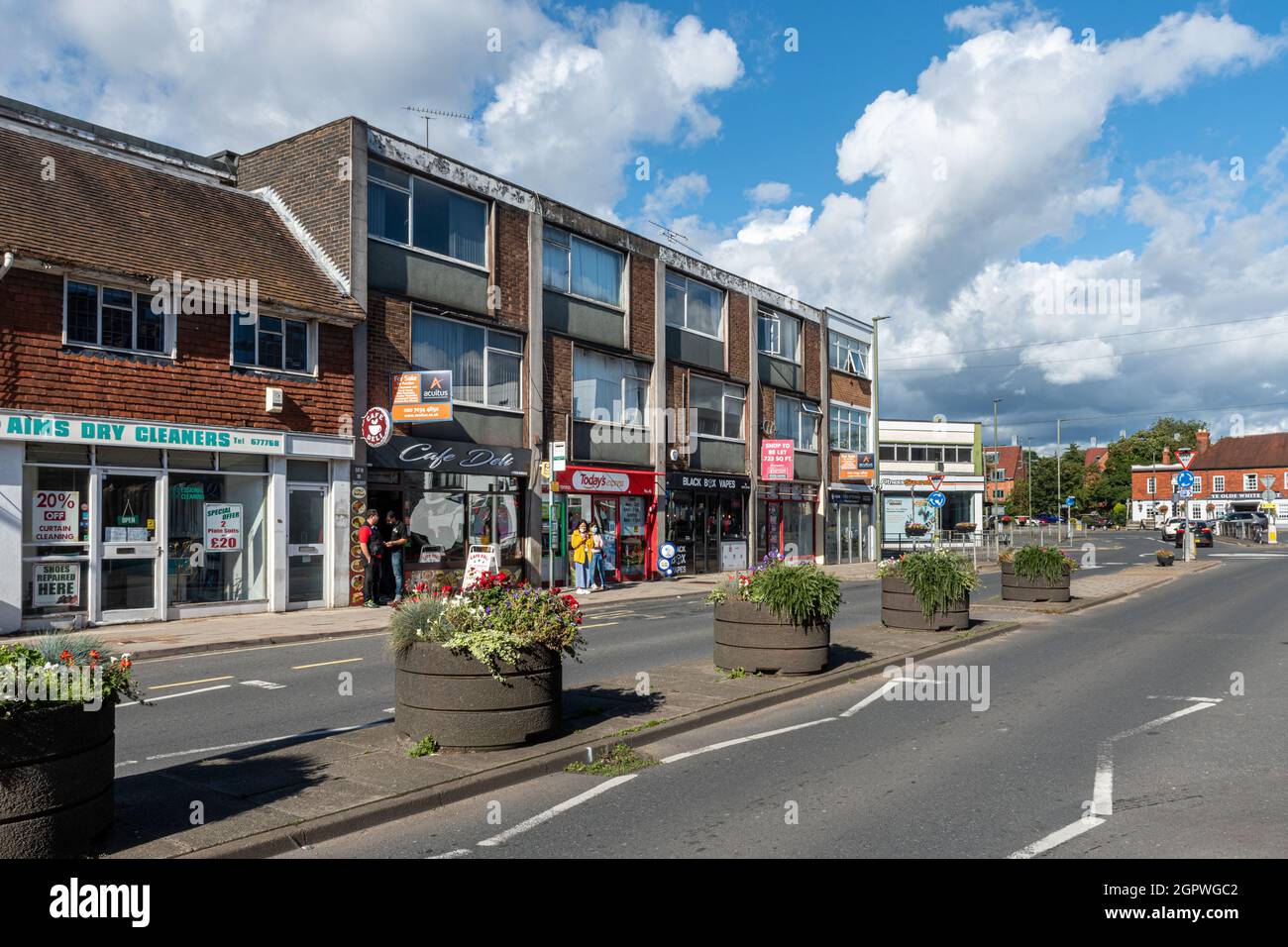 View of the High Street in Frimley town centre, Surrey, England, UK, with shops and businesses Stock Photo
