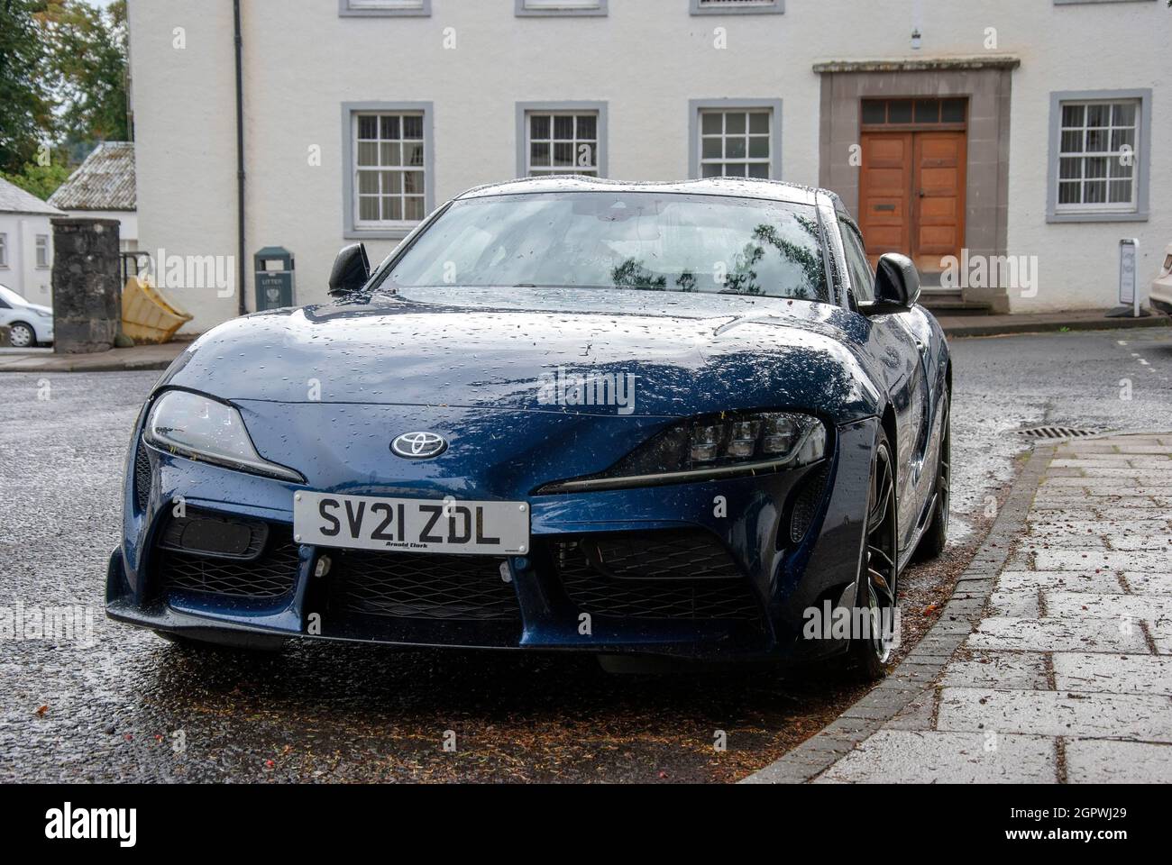 2021 Model Dark Blue Toyota GR Supra Grand Tourer Motor Car low angle front nearside passengers side view of blue fifth 5th generation 2021 model toyo Stock Photo