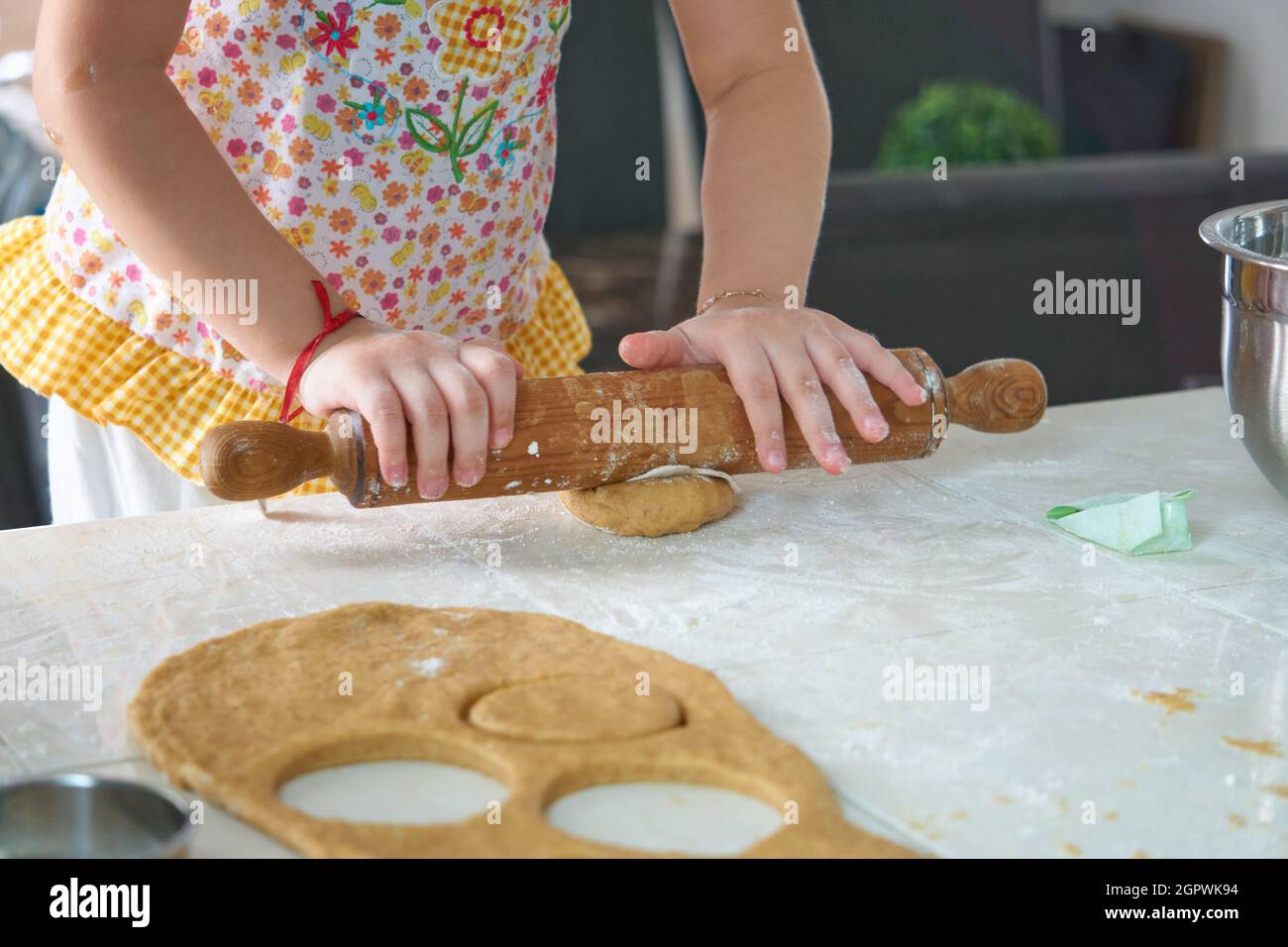 Girl Kneading Dough With A Roller Pin Stock Photo Alamy