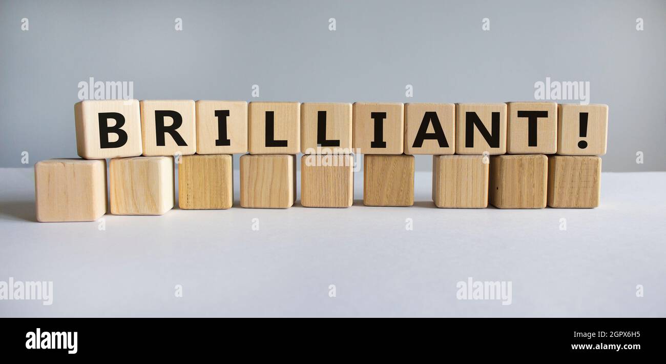 Brilliant symbol. The word brilliant on wooden cubes. Beautiful white ...