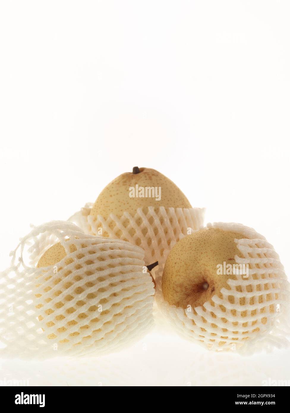 Food/fruit still life of Chinese white pear, Pyrus × bretschneideri, on plain background Stock Photo