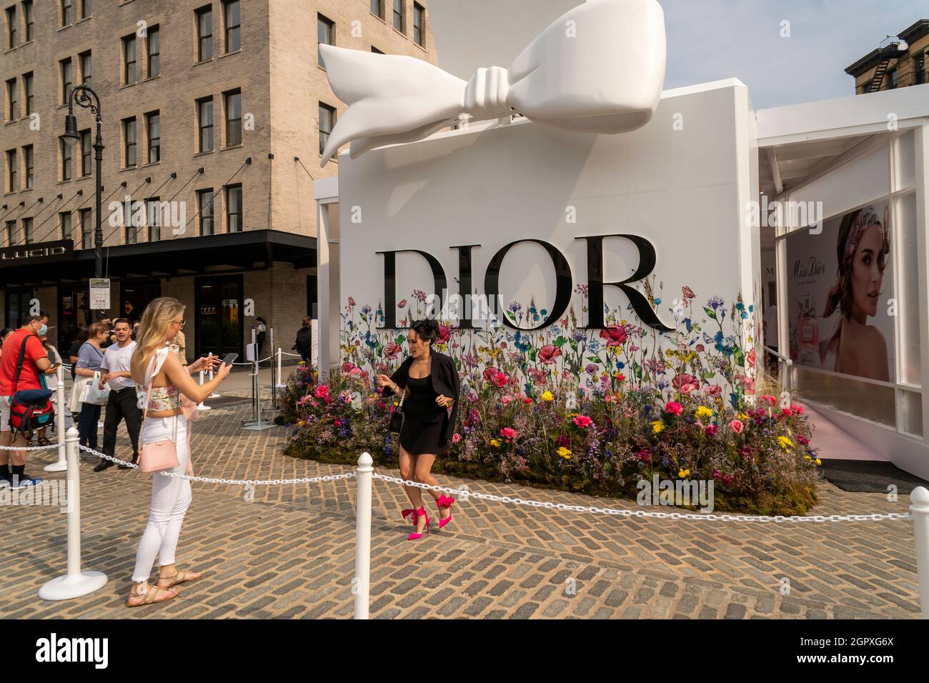 The fashionable flock to Gansevoort Plaza in the Meatpacking District in New York on Tuesday, September 14, 2021 for DiorÕs retail activation for their Miss Dior Eau de Parfum. The pop-up features beauty stations, lattes and instagrammable floral displays by the renowned florist Lewis Miller.(© Richard B. Levine) Stock Photo