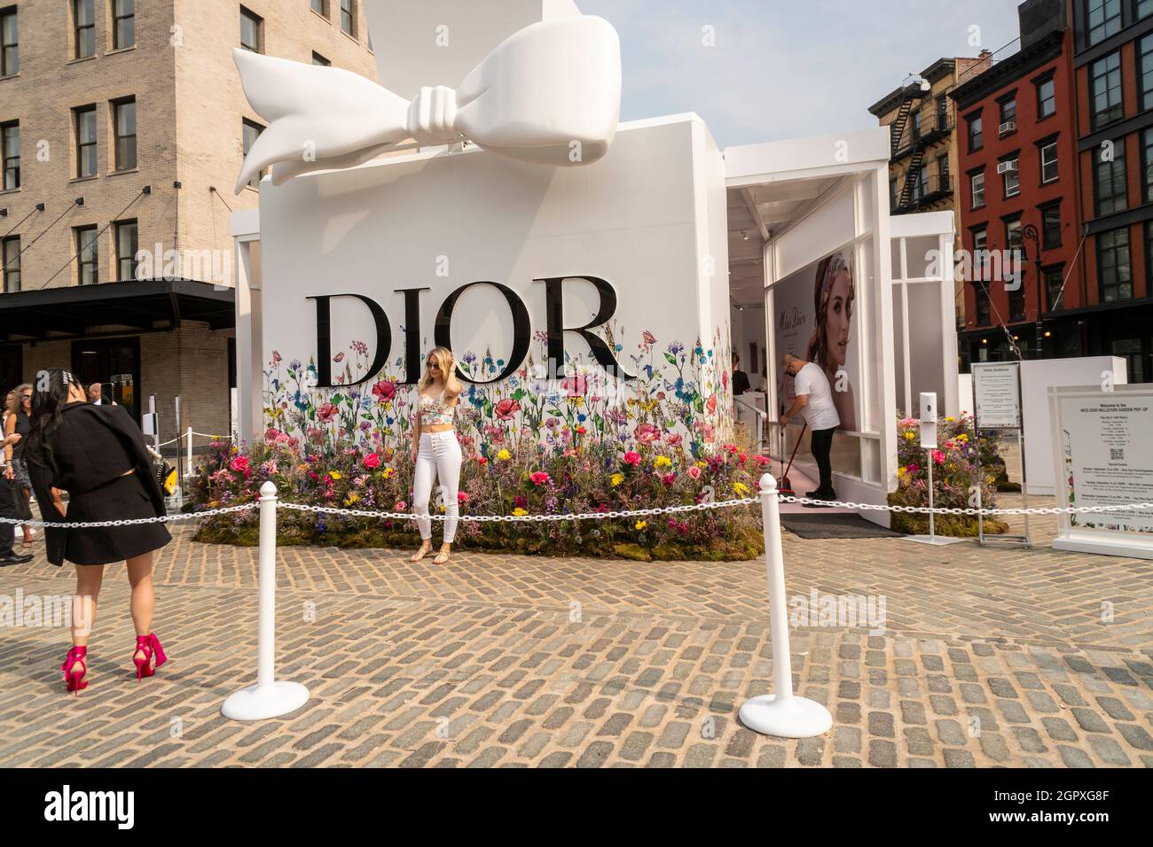 The fashionable flock to Gansevoort Plaza in the Meatpacking District in New York on Tuesday, September 14, 2021 for DiorÕs retail activation for their Miss Dior Eau de Parfum. The pop-up features beauty stations, lattes and instagrammable floral displays by the renowned florist Lewis Miller.(© Richard B. Levine) Stock Photo