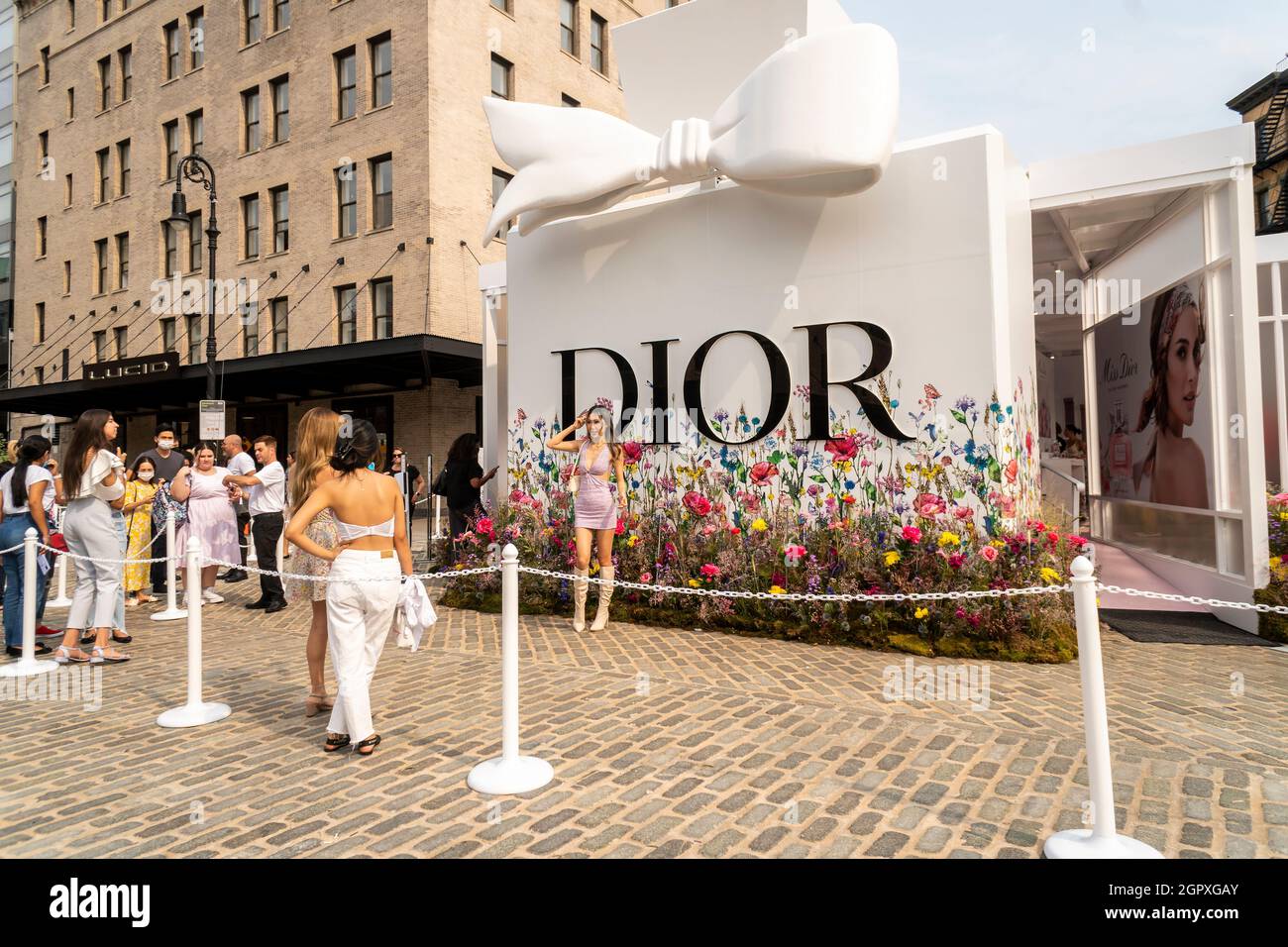 The fashionable flock to Gansevoort Plaza in the Meatpacking District in New York on Tuesday, September 14, 2021 for DiorÕs retail activation for their Miss Dior Eau de Parfum. The pop-up features beauty stations, lattes and instagrammable floral displays by the renowned florist Lewis Miller.(© Richard B. Levine) Stock Photo