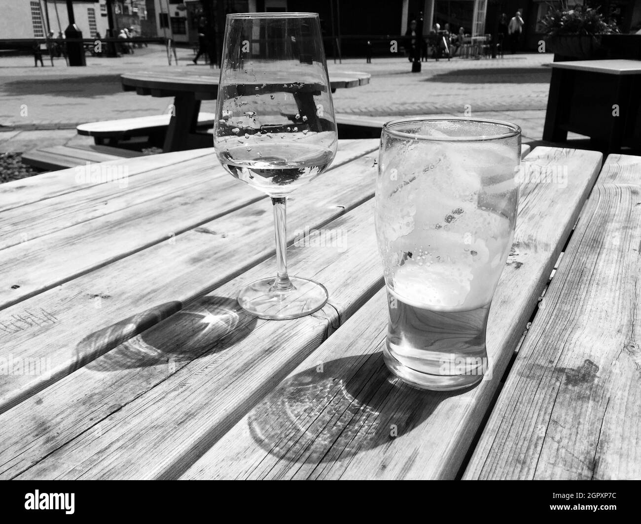 Black And White Photo Of Glasses On A Table Stock Photo Alamy