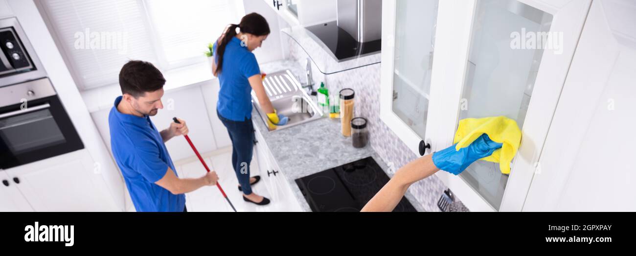 Janitor House Kitchen Cleaning Service. Professional Domestic Cleanup Stock Photo