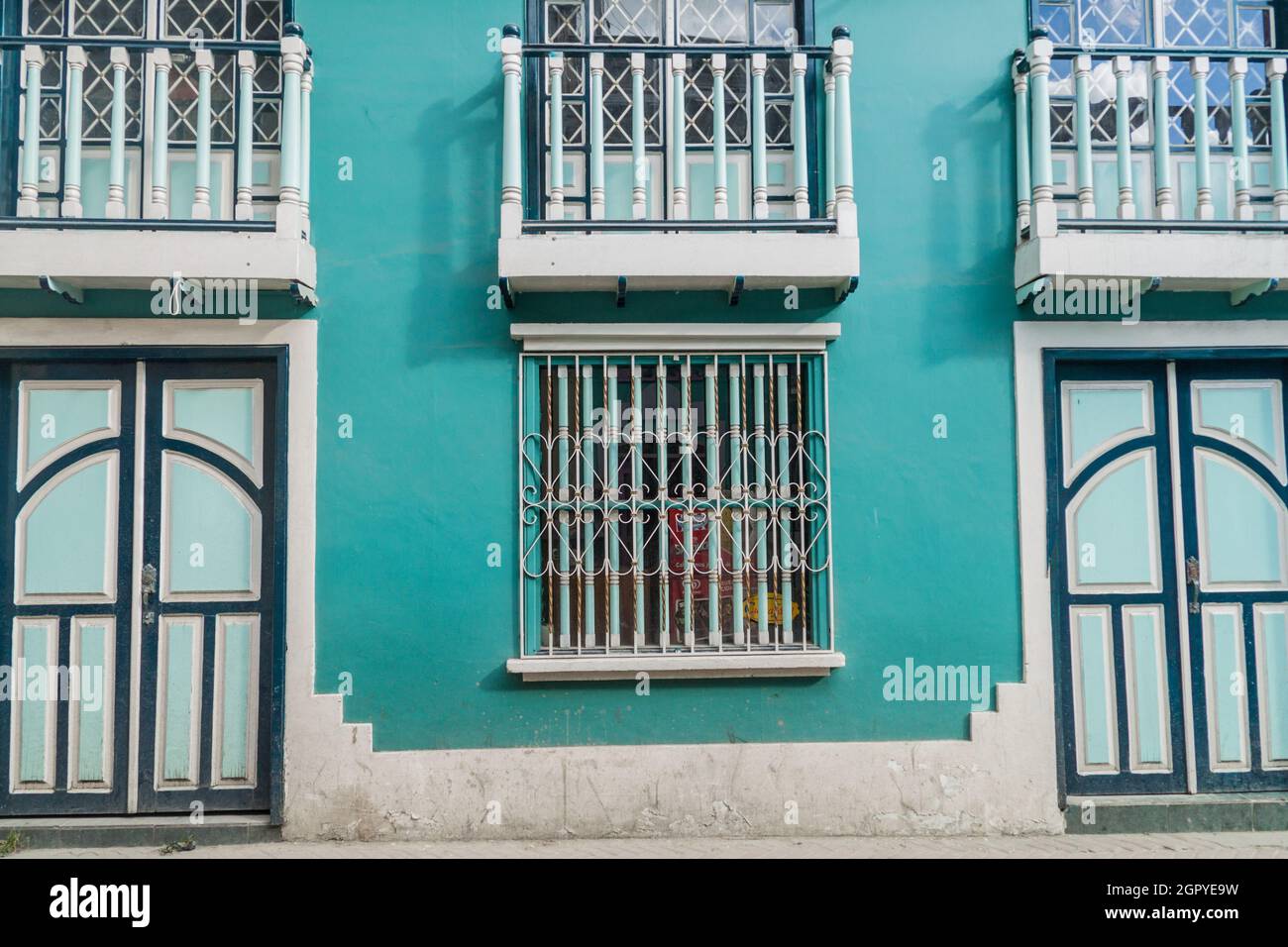 Colorful colonial house in Lourdes lane in Loja, Ecuador Stock Photo