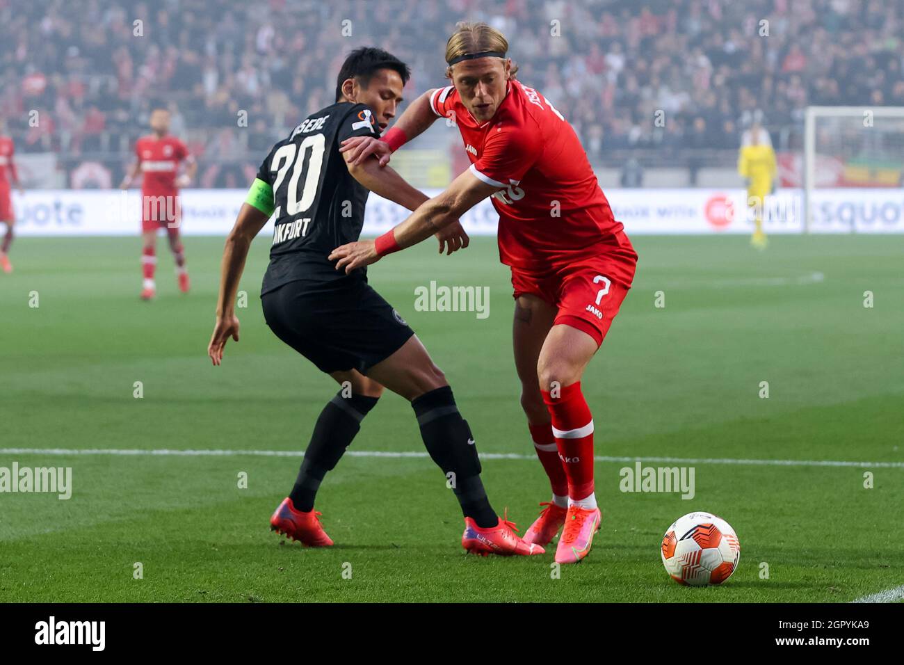ANTWERP, BELGIUM - SEPTEMBER 30: Makoto Hasebe of Eintracht Frankfurt and Viktor Fischer of Royal Antwerp FC battle for possession during the UEFA Europa League Group Stage match between Royal Antwerp FC and Eintracht Frankfurt at the Bosuil on September 30, 2021 in Antwerp, Belgium (Photo by Herman Dingler/Orange Pictures) Stock Photo