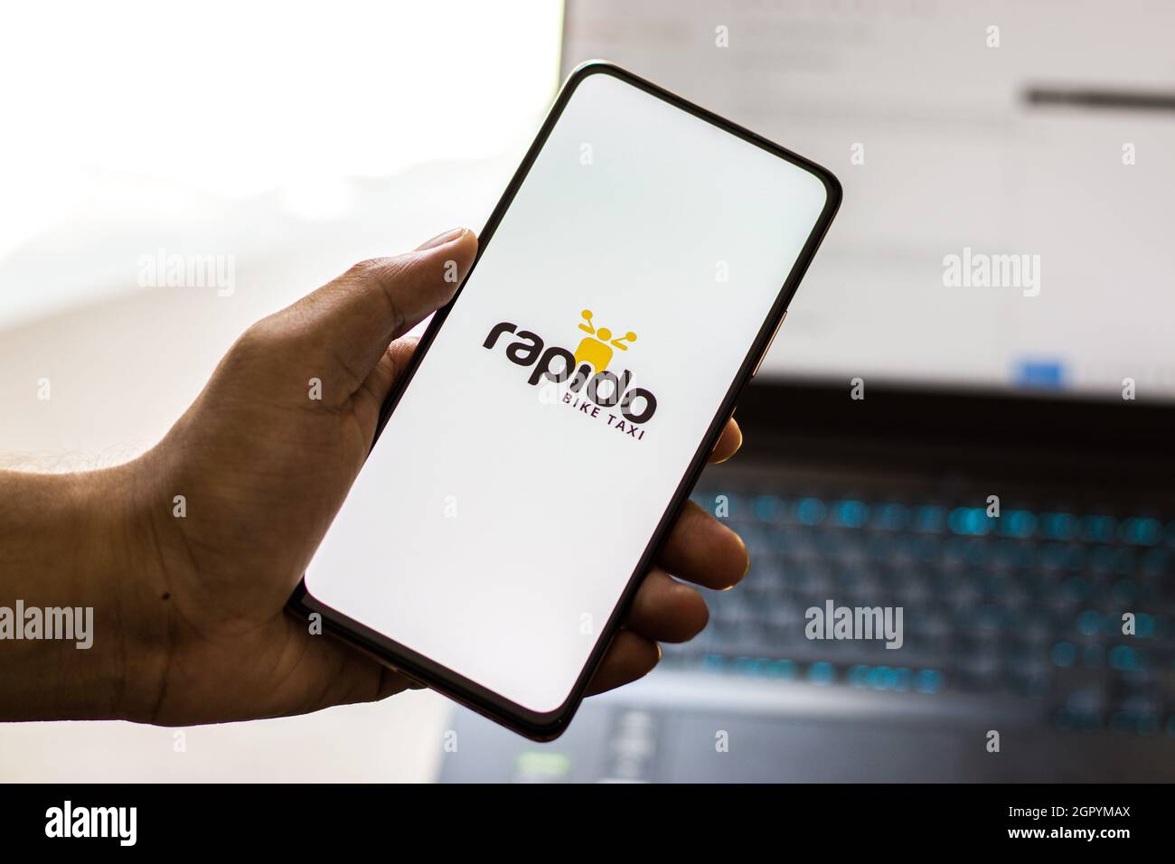 West Bangal, India - September 28, 2021 : Rapido logo on phone screen stock image. Stock Photo