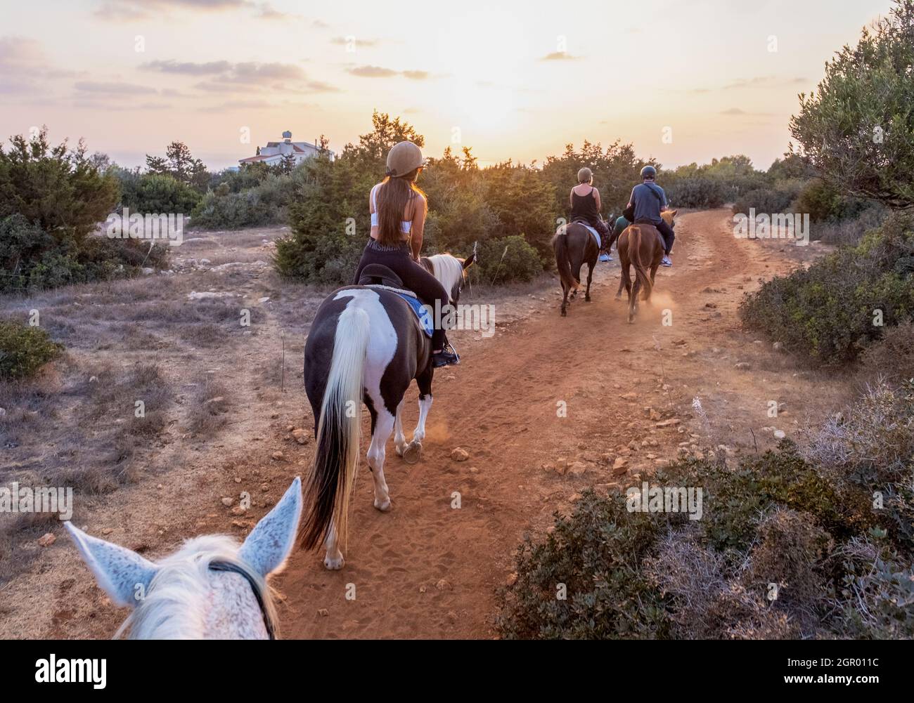 Georges Ranch horse riding sunset trek, Peyia, Paphos, Cyprus. Stock Photo
