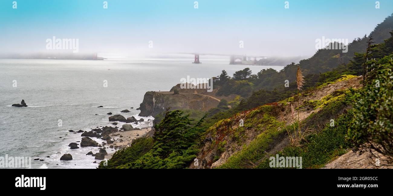 San Francisco County Park, Lands End, Bay Area, Foggy Weather, coastal views, fog pacific ocean, rocks on the beach Stock Photo