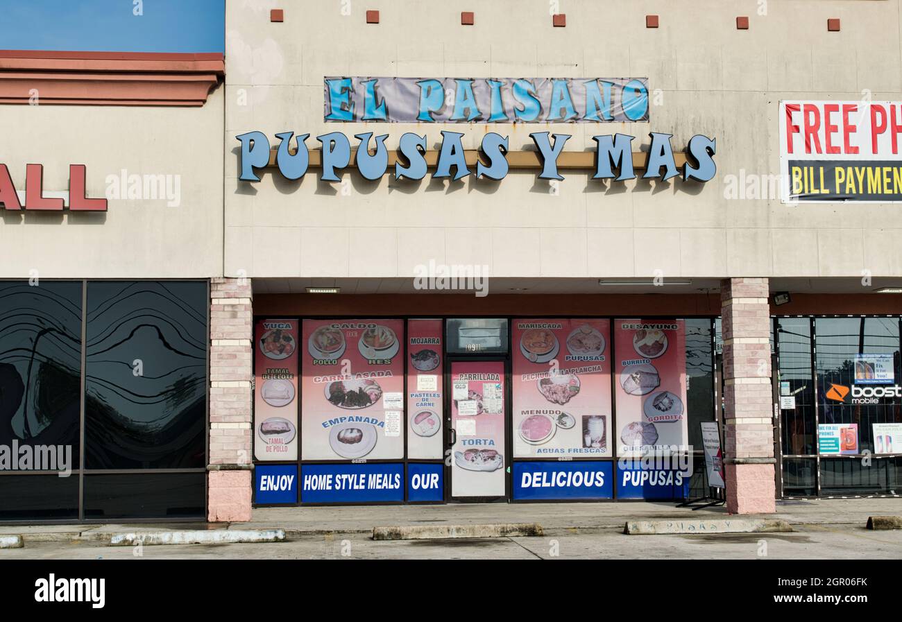 Houston, Texas USA 07-05-2021: El Paisano Pupusas Y Mas business exterior in Houston, TX. Latin American and Spanish restaurant in a local strip mall. Stock Photo
