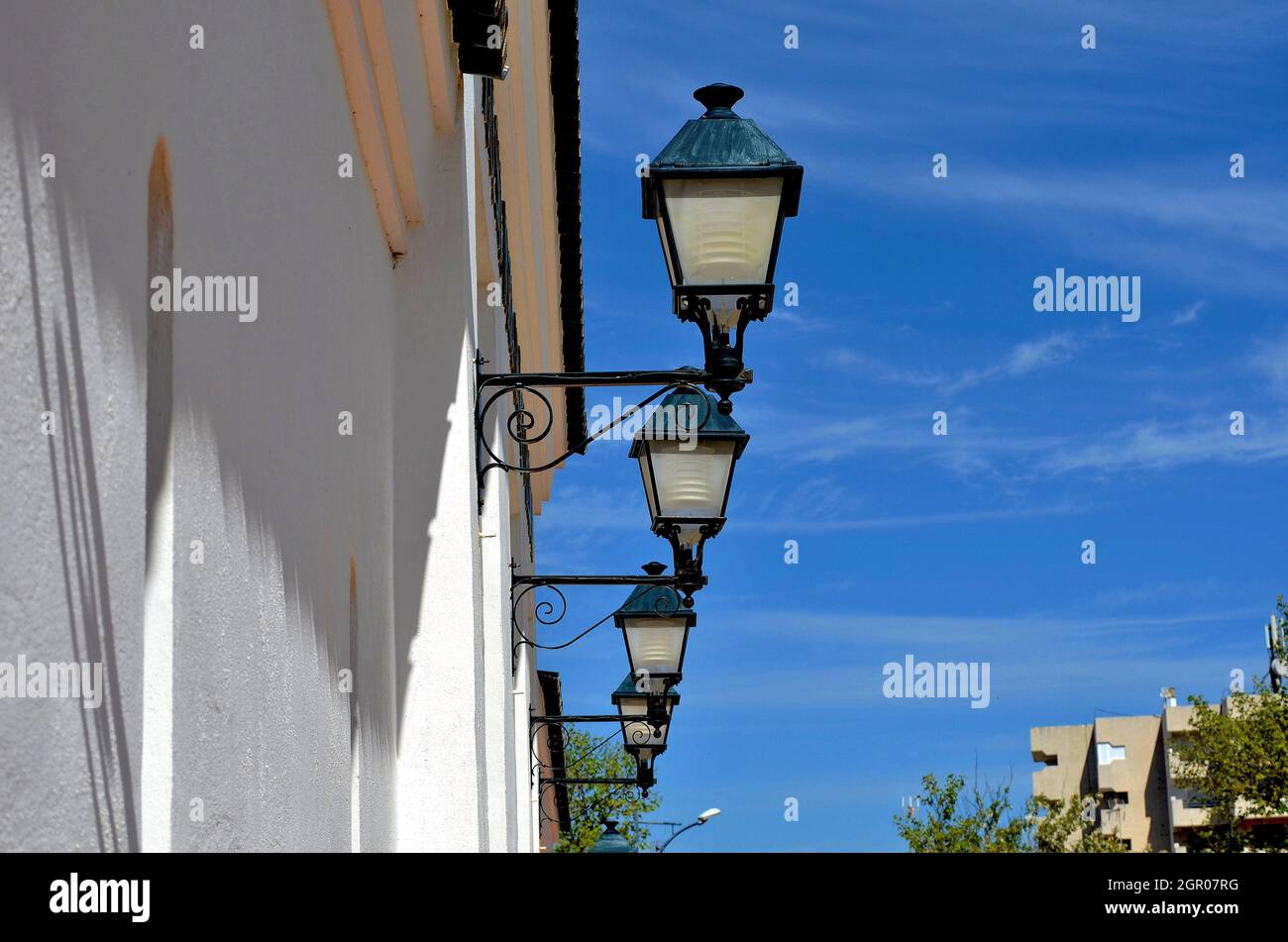 Low Angle View Of Lamp Post Against Blue Sky Stock Photo
