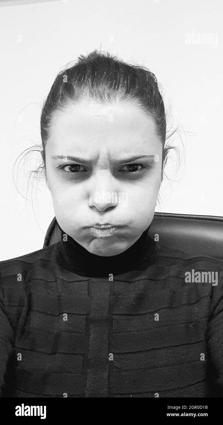 Closeup Portrait Of Young Man Against White Background Stock Photo Alamy