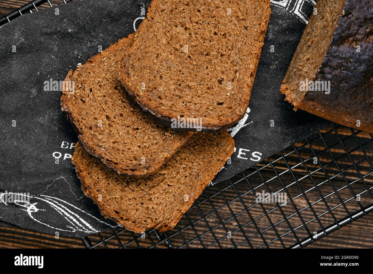 Overhead view of slices of artisan rye bread with rich texture Stock ...