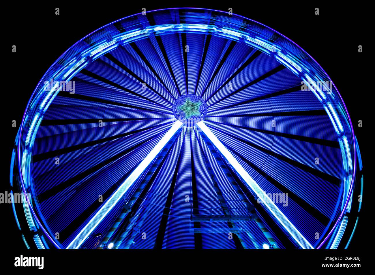 Ferris wheel at night, long exposure and blurred motion Stock Photo