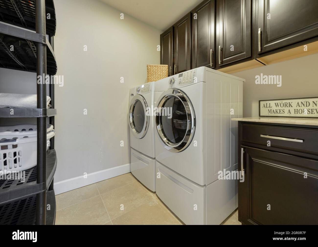 Modern residential laundry room interior Stock Photo Alamy