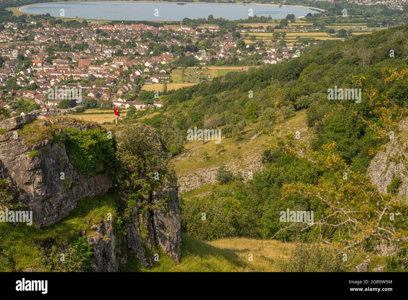 The view from the top of Cheddar Gorge looking towards the village of Cheddar and the Cheddar reservoir Stock Photo
