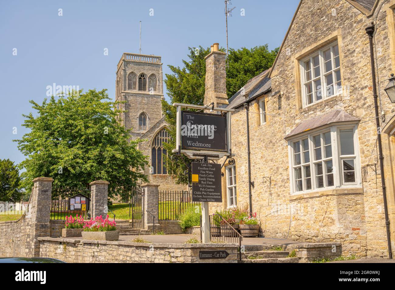 Church of St Mary and the old George Inn Wedmore Somerset Stock Photo