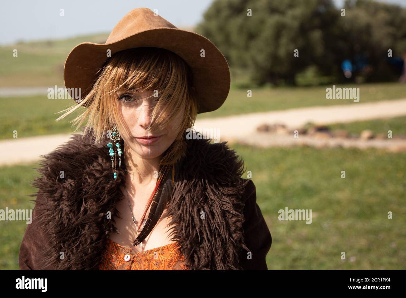 Young blonde boho female beauty on a nature background Stock Photo
