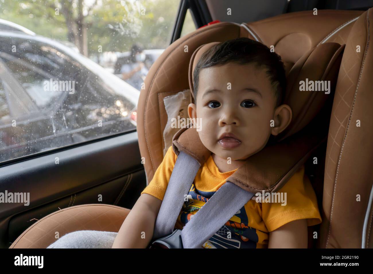 Baby in car seat laughing hires stock photography and images Alamy