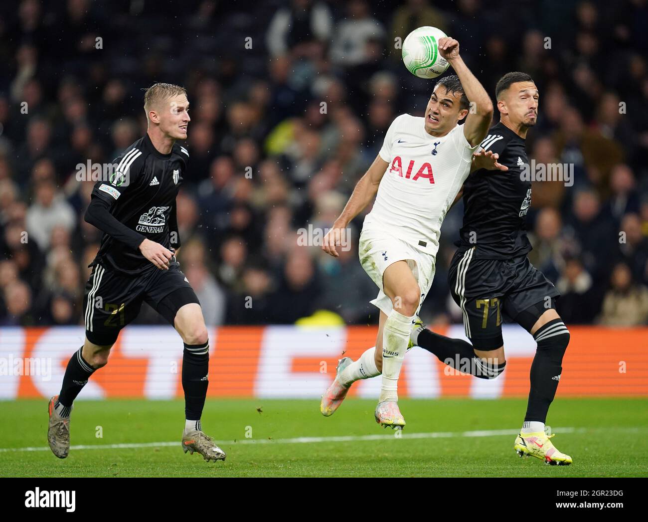 NS Mura's Zan Karnicnik, Tottenham Hotspur's Giovani Lo Celso, and NS Mura's Stanisa Mandic (left-right) battle for the ball during the UEFA Europa Conference League Group G match at the Tottenham Hotspur Stadium, London. Picture date: Thursday September 30, 2021. Stock Photo