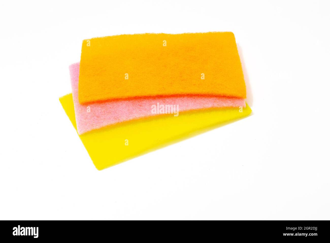 multicolored sponges for washing dishes, universal cleaning products