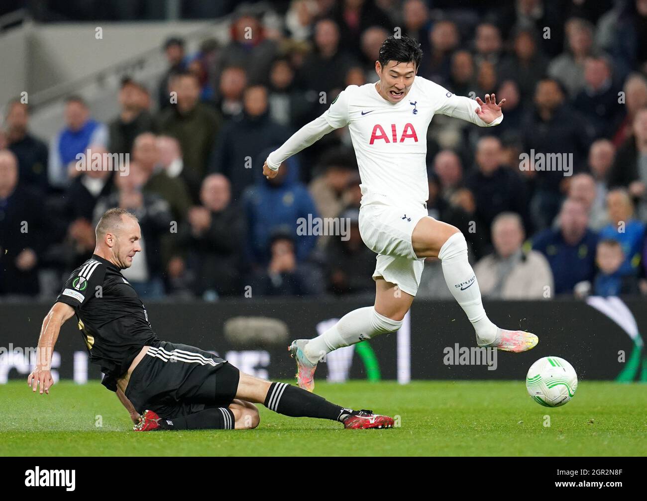 NS Mura's Matic Marusko (left)challenges Tottenham Hotspur's Son Heung-min during the UEFA Europa Conference League Group G match at the Tottenham Hotspur Stadium, London. Picture date: Thursday September 30, 2021. Stock Photo