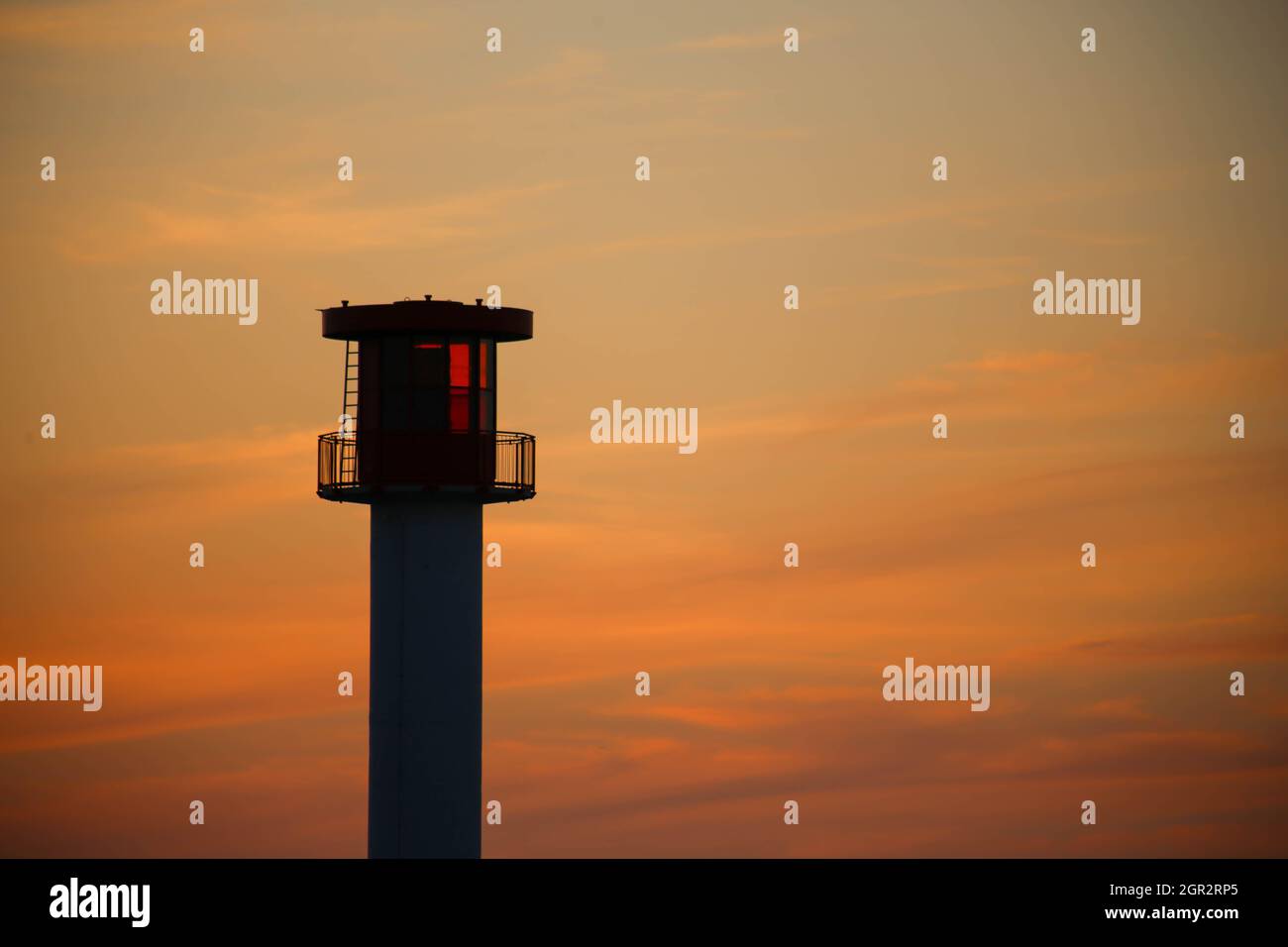 Low Angle View Of Silhouette Tower Against Sky During Sunset Stock Photo