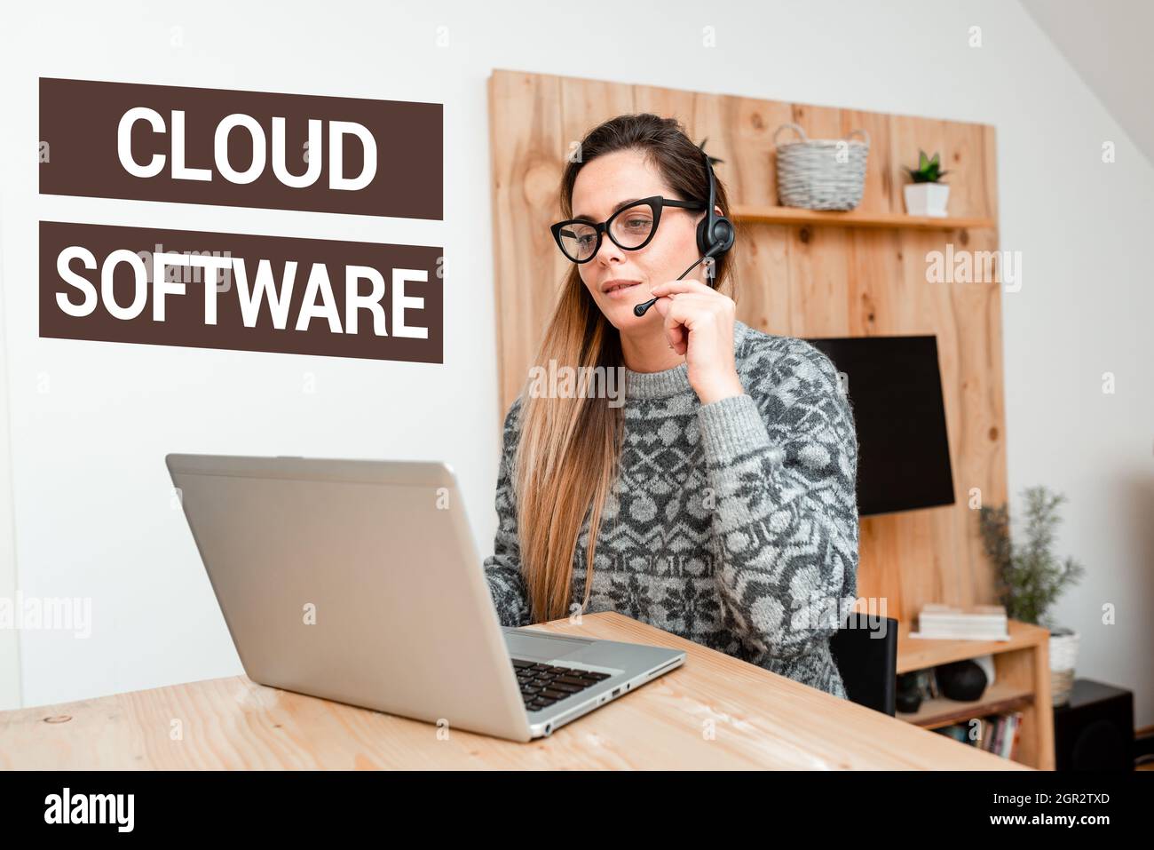 Handwriting text Cloud Software. Internet Concept Programs used in Storing Accessing data over the internet Callcenter Agent Working From Home Stock Photo