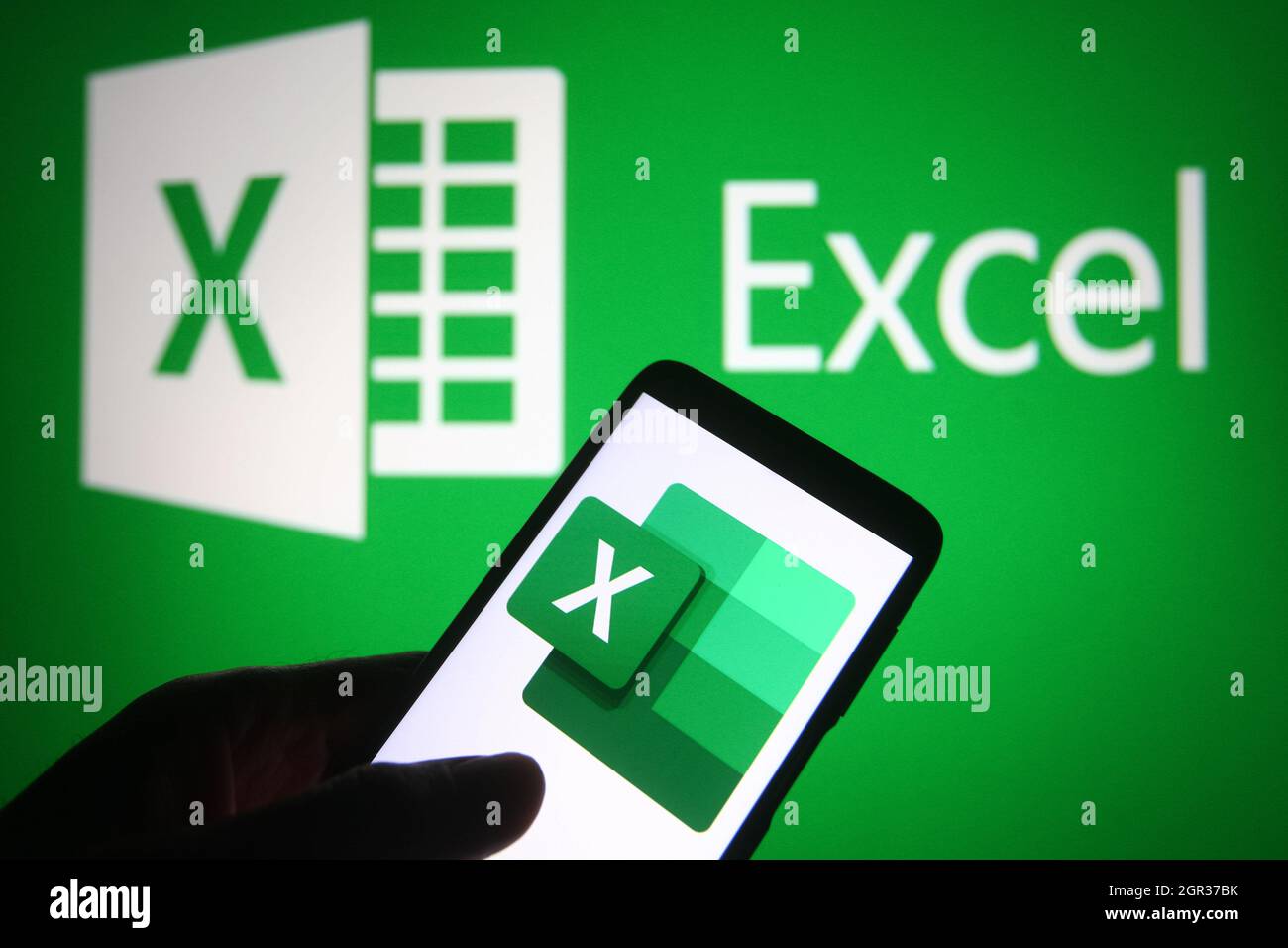 Ukraine. 30th Sep, 2021. In this photo illustration a Microsoft Excel logo is seen on a smartphone and a pc screen. Credit: SOPA Images Limited/Alamy Live News Stock Photo