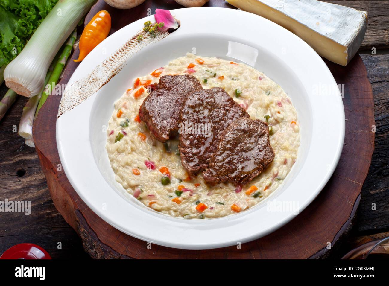 Risotto with roasted meat food Stock Photo - Alamy