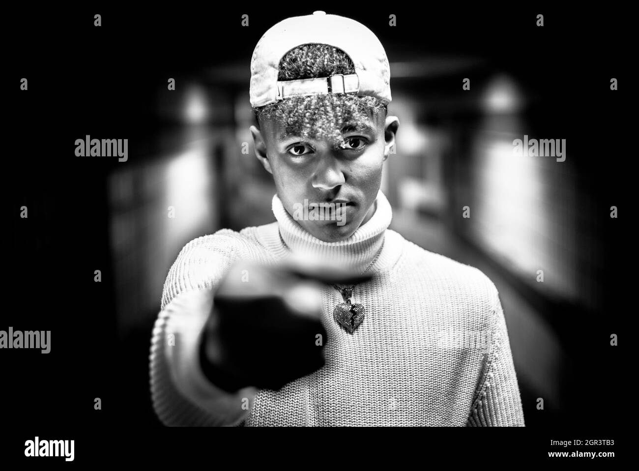 Boy cap standing Black and White Stock Photos & Images - Alamy