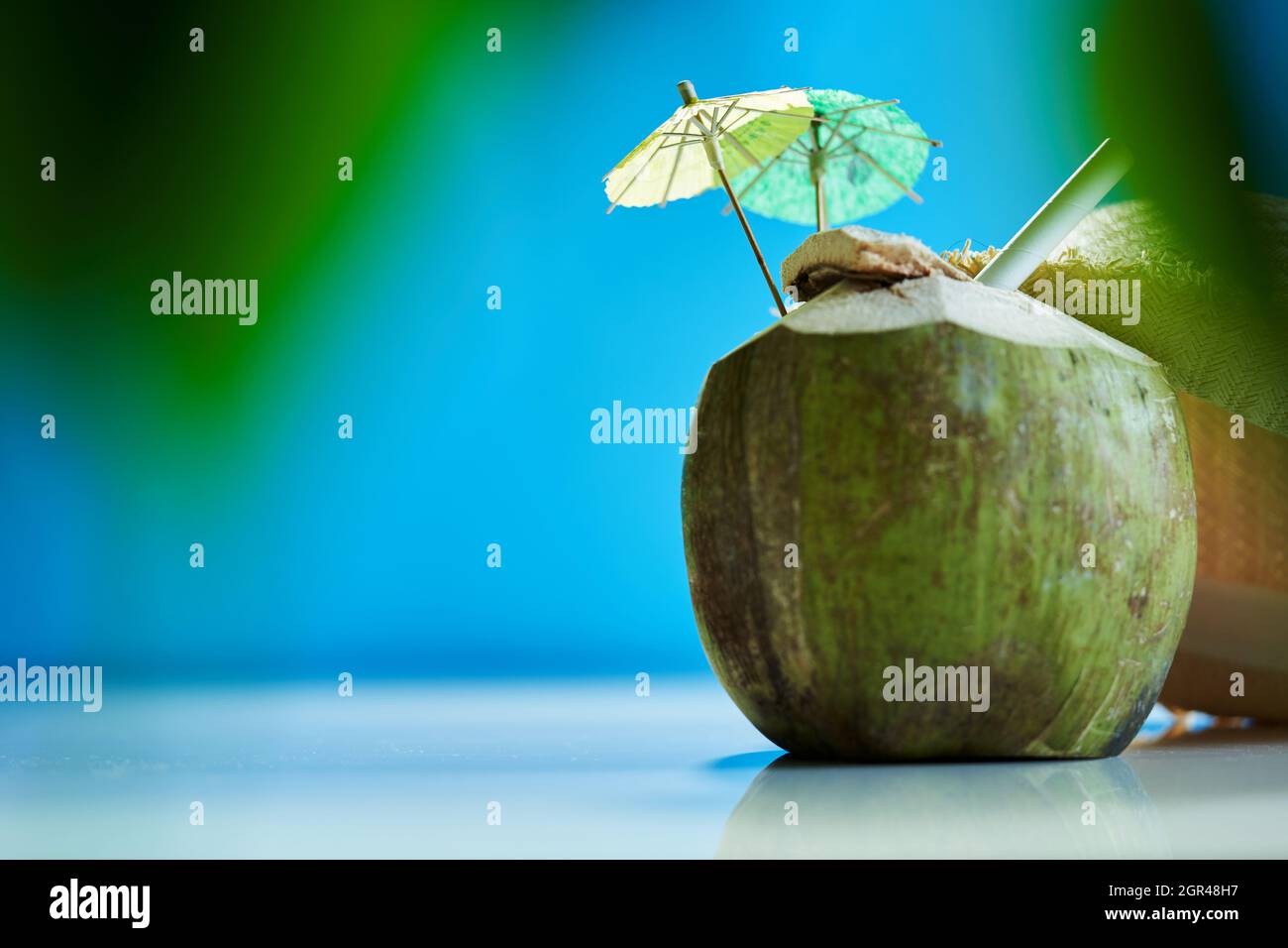 Straw Hat ,coconut Drink Decorated With Mini Umbrella And Straw Stock