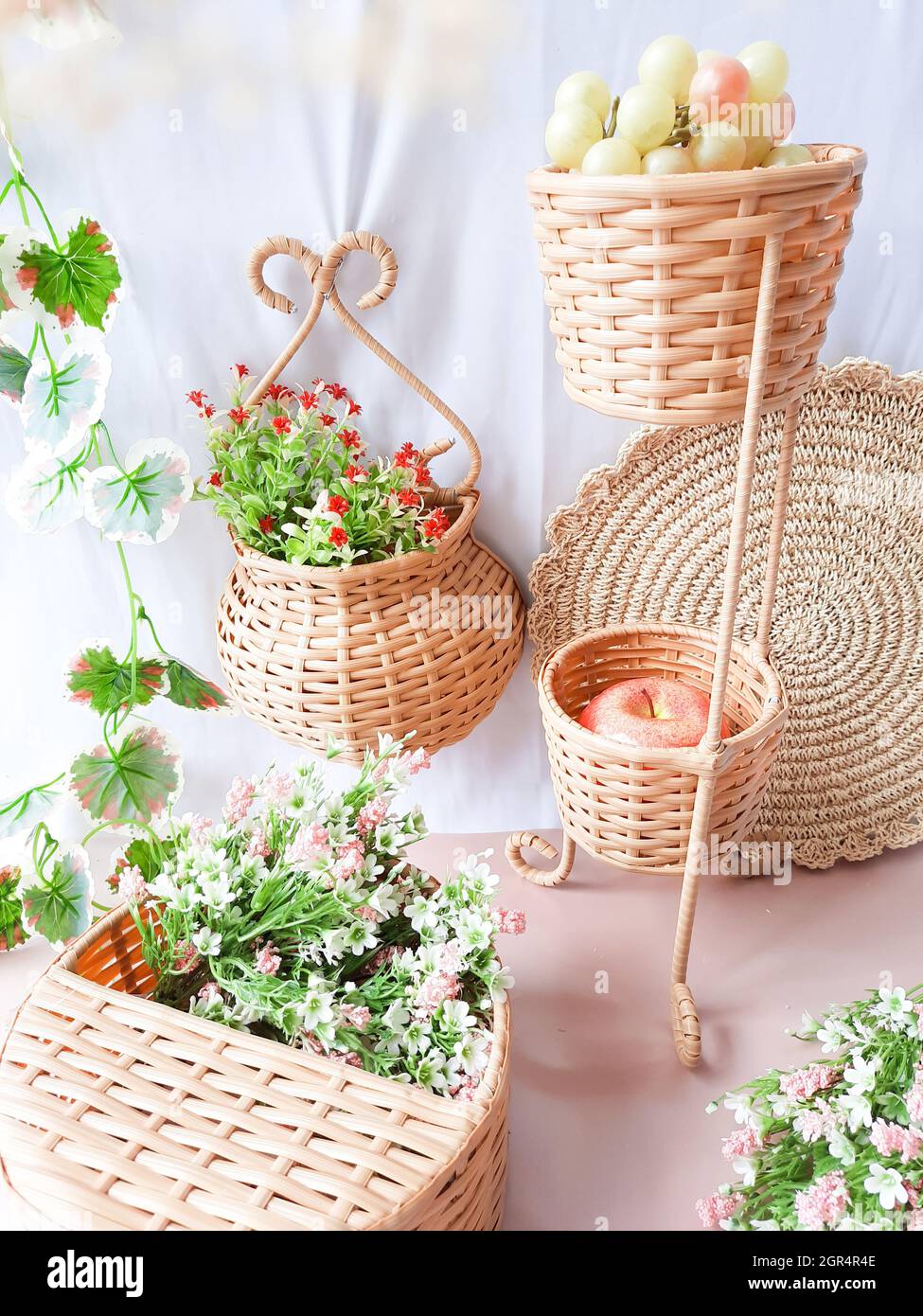 High Angle View Of Potted Plants In Basket On Table Stock Photo