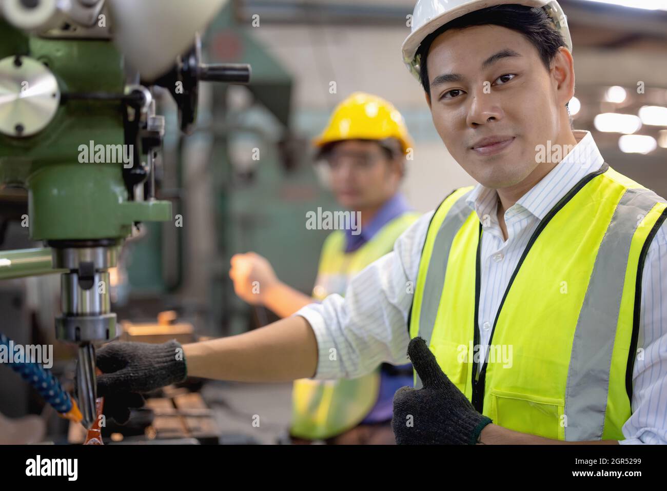 Two Workers In Production Plant As Team Discussing, Industrial Scene In